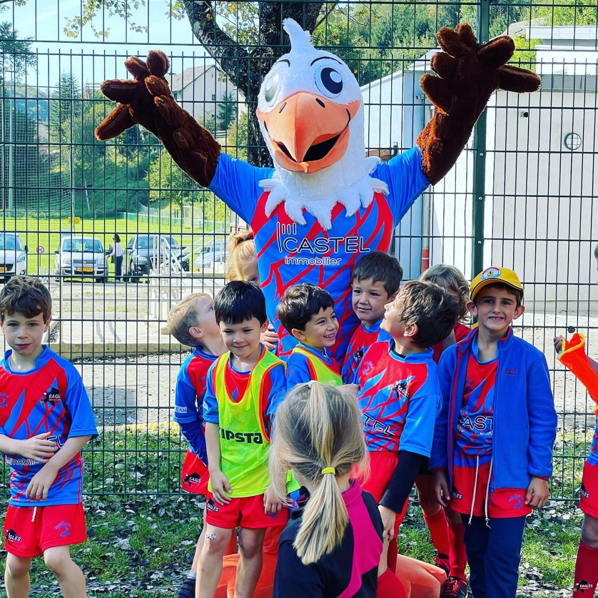Children with Eagly, a key member of the Rugby Eagles Luxembourg Children with Eagly, a key member of the Rugby Eagles Luxembourg